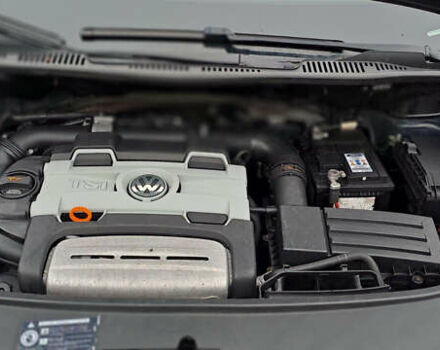 Черный Фольксваген Туран, объемом двигателя 1.4 л и пробегом 193 тыс. км за 6950 $, фото 24 на Automoto.ua