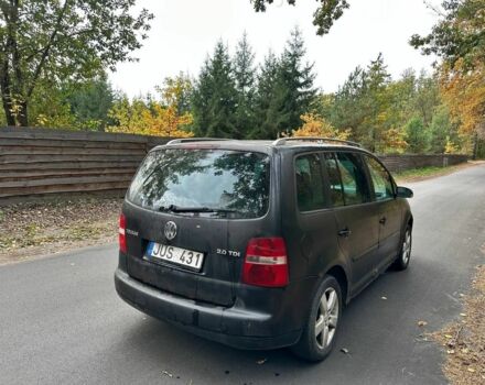 Черный Фольксваген Туран, объемом двигателя 1.9 л и пробегом 244 тыс. км за 1650 $, фото 5 на Automoto.ua