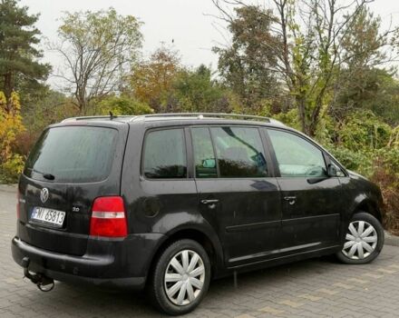 Черный Фольксваген Туран, объемом двигателя 1.9 л и пробегом 225 тыс. км за 2450 $, фото 3 на Automoto.ua