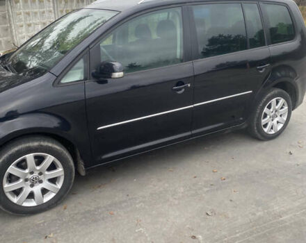 Чорний Фольксваген Туран, об'ємом двигуна 1.39 л та пробігом 187 тис. км за 6500 $, фото 10 на Automoto.ua