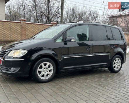 Черный Фольксваген Туран, объемом двигателя 1.4 л и пробегом 193 тыс. км за 6950 $, фото 18 на Automoto.ua