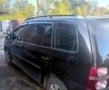 Черный Фольксваген Туран, объемом двигателя 1.4 л и пробегом 250 тыс. км за 4500 $, фото 2 на Automoto.ua