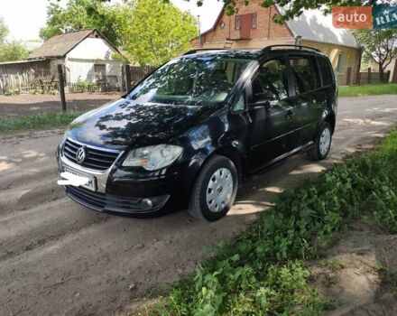Черный Фольксваген Туран, объемом двигателя 2 л и пробегом 285 тыс. км за 7700 $, фото 4 на Automoto.ua