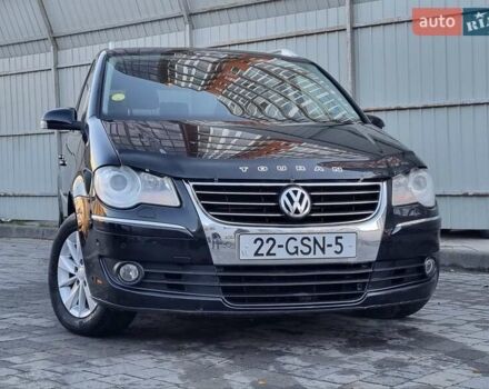 Черный Фольксваген Туран, объемом двигателя 1.4 л и пробегом 193 тыс. км за 7300 $, фото 21 на Automoto.ua