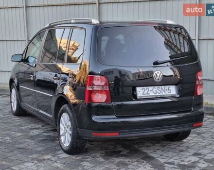 Черный Фольксваген Туран, объемом двигателя 1.4 л и пробегом 193 тыс. км за 7300 $, фото 32 на Automoto.ua