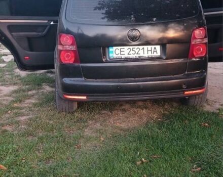 Черный Фольксваген Туран, объемом двигателя 1.9 л и пробегом 311 тыс. км за 5400 $, фото 5 на Automoto.ua