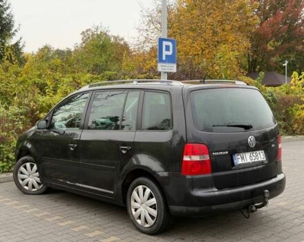 Черный Фольксваген Туран, объемом двигателя 1.9 л и пробегом 225 тыс. км за 2450 $, фото 2 на Automoto.ua