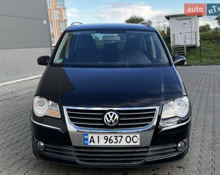 Черный Фольксваген Туран, объемом двигателя 1.39 л и пробегом 250 тыс. км за 6000 $, фото 2 на Automoto.ua