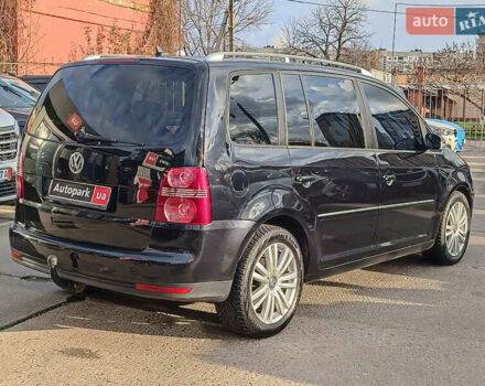 Черный Фольксваген Туран, объемом двигателя 2 л и пробегом 260 тыс. км за 9390 $, фото 7 на Automoto.ua