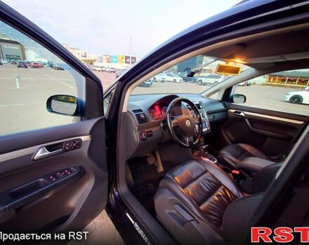 Чорний Фольксваген Туран, об'ємом двигуна 2 л та пробігом 240 тис. км за 7700 $, фото 11 на Automoto.ua