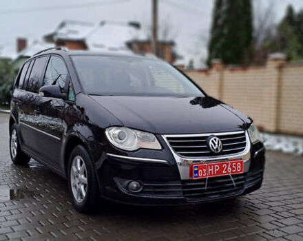 Черный Фольксваген Туран, объемом двигателя 1.4 л и пробегом 193 тыс. км за 6950 $, фото 15 на Automoto.ua