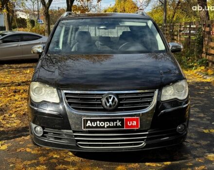 Фольксваген Туран 2007 в Киеве на Automoto.ua Черный Фольксваген Туран, объемом двигателя 1.4 л и пробегом 242 тыс. км за 6390 $, фото 1 на Automoto.ua