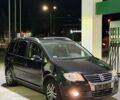 Черный Фольксваген Туран, объемом двигателя 1.9 л и пробегом 330 тыс. км за 2697 $, фото 1 на Automoto.ua