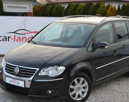 Черный Фольксваген Туран, объемом двигателя 2 л и пробегом 216 тыс. км за 5399 $, фото 3 на Automoto.ua