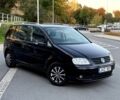 Чорний Фольксваген Туран, об'ємом двигуна 2 л та пробігом 170 тис. км за 1800 $, фото 1 на Automoto.ua