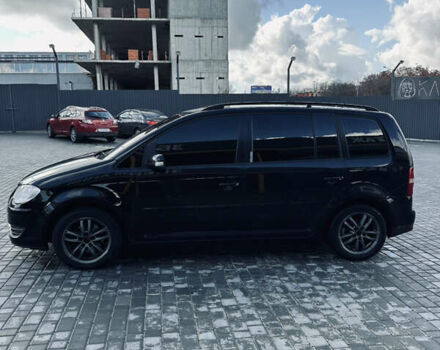 Черный Фольксваген Туран, объемом двигателя 1.39 л и пробегом 242 тыс. км за 7500 $, фото 4 на Automoto.ua