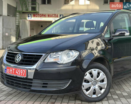Черный Фольксваген Туран, объемом двигателя 1.6 л и пробегом 230 тыс. км за 7400 $, фото 5 на Automoto.ua