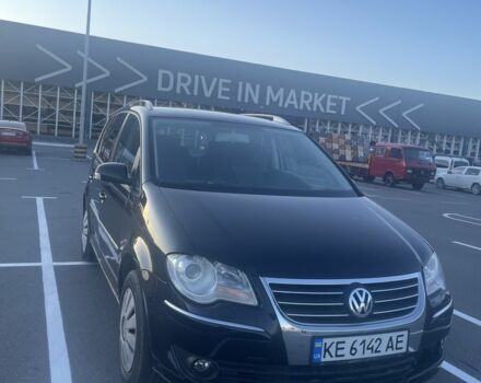 Черный Фольксваген Туран, объемом двигателя 1.4 л и пробегом 132 тыс. км за 5600 $, фото 1 на Automoto.ua