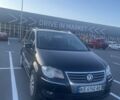 Черный Фольксваген Туран, объемом двигателя 1.4 л и пробегом 132 тыс. км за 5600 $, фото 1 на Automoto.ua