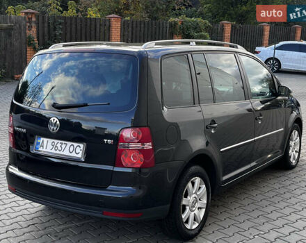 Черный Фольксваген Туран, объемом двигателя 1.39 л и пробегом 250 тыс. км за 6000 $, фото 1 на Automoto.ua