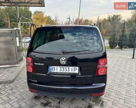 Черный Фольксваген Туран, объемом двигателя 1.97 л и пробегом 314 тыс. км за 7300 $, фото 10 на Automoto.ua