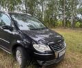 Чорний Фольксваген Туран, об'ємом двигуна 2 л та пробігом 309 тис. км за 5600 $, фото 1 на Automoto.ua