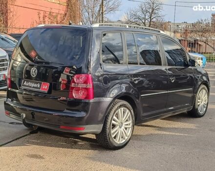 Чорний Фольксваген Туран, об'ємом двигуна 2 л та пробігом 260 тис. км за 9390 $, фото 7 на Automoto.ua