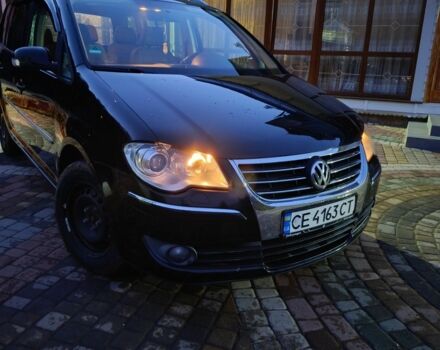 Черный Фольксваген Туран, объемом двигателя 2 л и пробегом 320 тыс. км за 6800 $, фото 2 на Automoto.ua