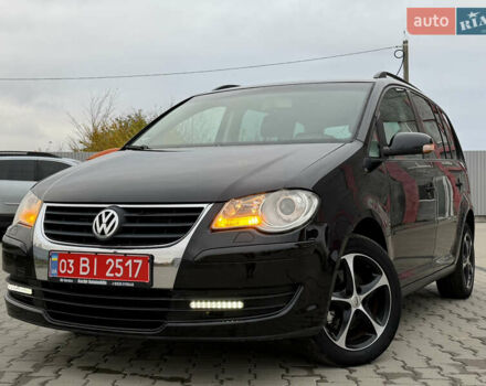 Чорний Фольксваген Туран, об'ємом двигуна 1.6 л та пробігом 201 тис. км за 7350 $, фото 1 на Automoto.ua