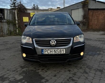 Черный Фольксваген Туран, объемом двигателя 2 л и пробегом 300 тыс. км за 3300 $, фото 1 на Automoto.ua