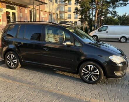 Черный Фольксваген Туран, объемом двигателя 1.4 л и пробегом 271 тыс. км за 5000 $, фото 2 на Automoto.ua