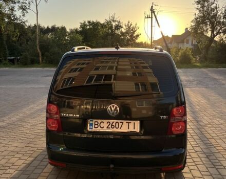 Черный Фольксваген Туран, объемом двигателя 1.4 л и пробегом 271 тыс. км за 5000 $, фото 1 на Automoto.ua