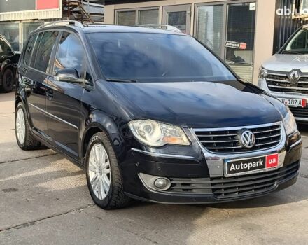 Чорний Фольксваген Туран, об'ємом двигуна 2 л та пробігом 260 тис. км за 9390 $, фото 6 на Automoto.ua