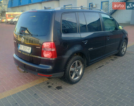 Черный Фольксваген Туран, объемом двигателя 2 л и пробегом 290 тыс. км за 6500 $, фото 3 на Automoto.ua