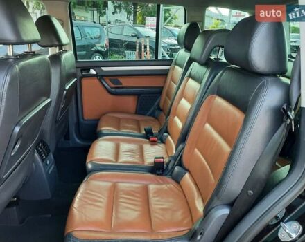 Черный Фольксваген Туран, объемом двигателя 1.6 л и пробегом 213 тыс. км за 8550 $, фото 80 на Automoto.ua