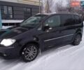Черный Фольксваген Туран, объемом двигателя 1.4 л и пробегом 220 тыс. км за 6700 $, фото 1 на Automoto.ua