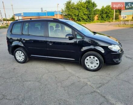 Черный Фольксваген Туран, объемом двигателя 1.6 л и пробегом 213 тыс. км за 8550 $, фото 24 на Automoto.ua