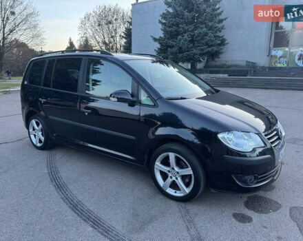 Черный Фольксваген Туран, объемом двигателя 1.4 л и пробегом 224 тыс. км за 6499 $, фото 7 на Automoto.ua