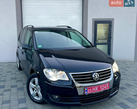 Чорний Фольксваген Туран, об'ємом двигуна 2 л та пробігом 292 тис. км за 8999 $, фото 5 на Automoto.ua