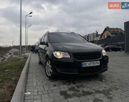 Черный Фольксваген Туран, объемом двигателя 1.4 л и пробегом 247 тыс. км за 7500 $, фото 2 на Automoto.ua