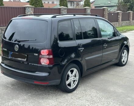 Черный Фольксваген Туран, объемом двигателя 1.9 л и пробегом 280 тыс. км за 4500 $, фото 4 на Automoto.ua