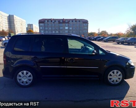 Черный Фольксваген Туран, объемом двигателя 1.4 л и пробегом 291 тыс. км за 6050 $, фото 3 на Automoto.ua