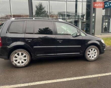 Черный Фольксваген Туран, объемом двигателя 2 л и пробегом 208 тыс. км за 7771 $, фото 5 на Automoto.ua
