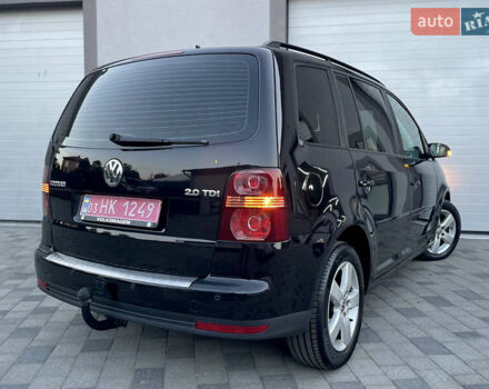 Чорний Фольксваген Туран, об'ємом двигуна 2 л та пробігом 292 тис. км за 8999 $, фото 36 на Automoto.ua