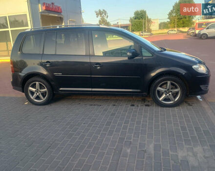 Черный Фольксваген Туран, объемом двигателя 2 л и пробегом 290 тыс. км за 6500 $, фото 1 на Automoto.ua