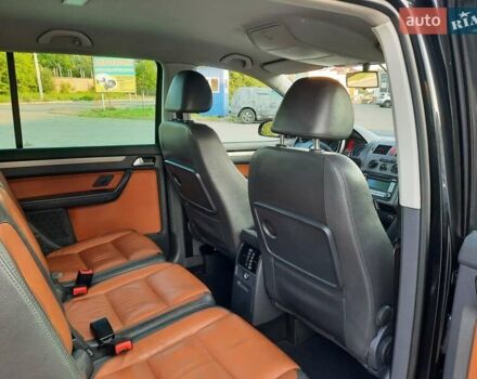 Черный Фольксваген Туран, объемом двигателя 1.6 л и пробегом 213 тыс. км за 8550 $, фото 133 на Automoto.ua