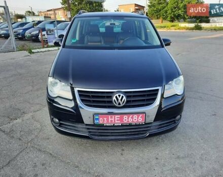 Черный Фольксваген Туран, объемом двигателя 1.6 л и пробегом 213 тыс. км за 8550 $, фото 4 на Automoto.ua