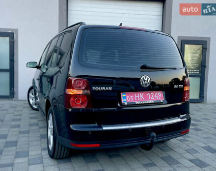 Чорний Фольксваген Туран, об'ємом двигуна 2 л та пробігом 292 тис. км за 8999 $, фото 27 на Automoto.ua