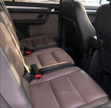 Черный Фольксваген Туран, объемом двигателя 1.39 л и пробегом 175 тыс. км за 9400 $, фото 1 на Automoto.ua