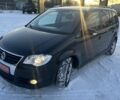 Черный Фольксваген Туран, объемом двигателя 1.4 л и пробегом 145 тыс. км за 8699 $, фото 1 на Automoto.ua